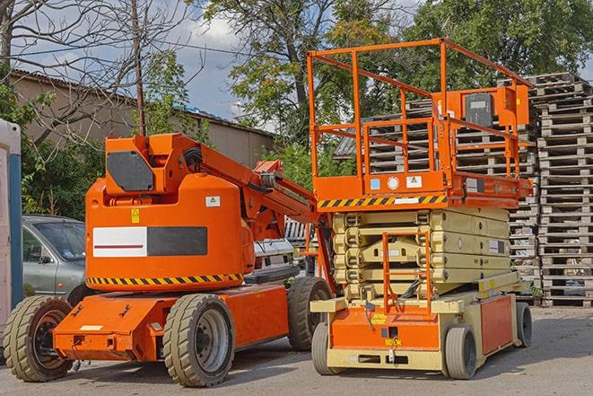 warehouse forklift in action with neatly arranged pallets in Foothill Ranch